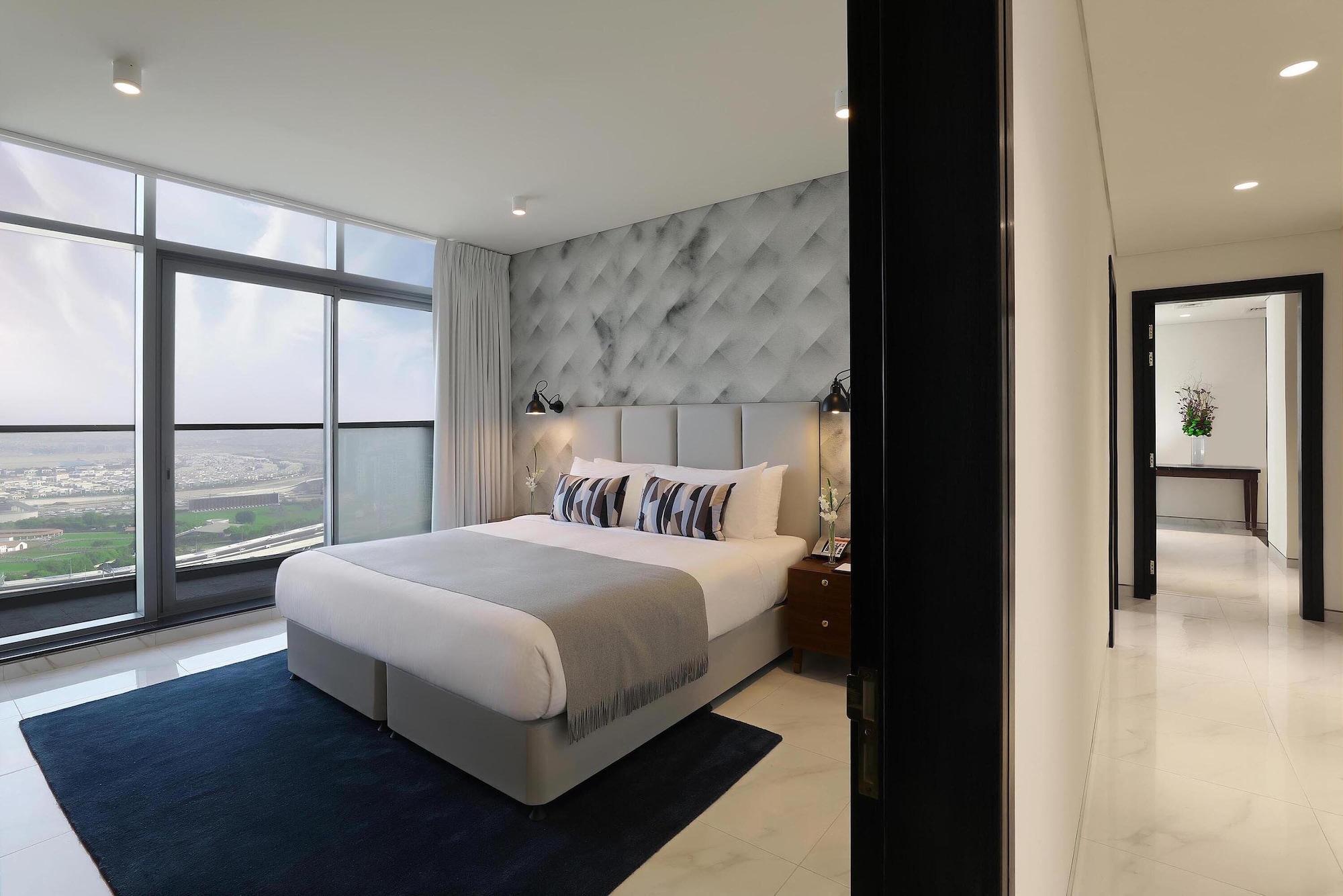 Aparthotel Millennium Atria Business Bay Dubái Exterior foto A bedroom at the hotel