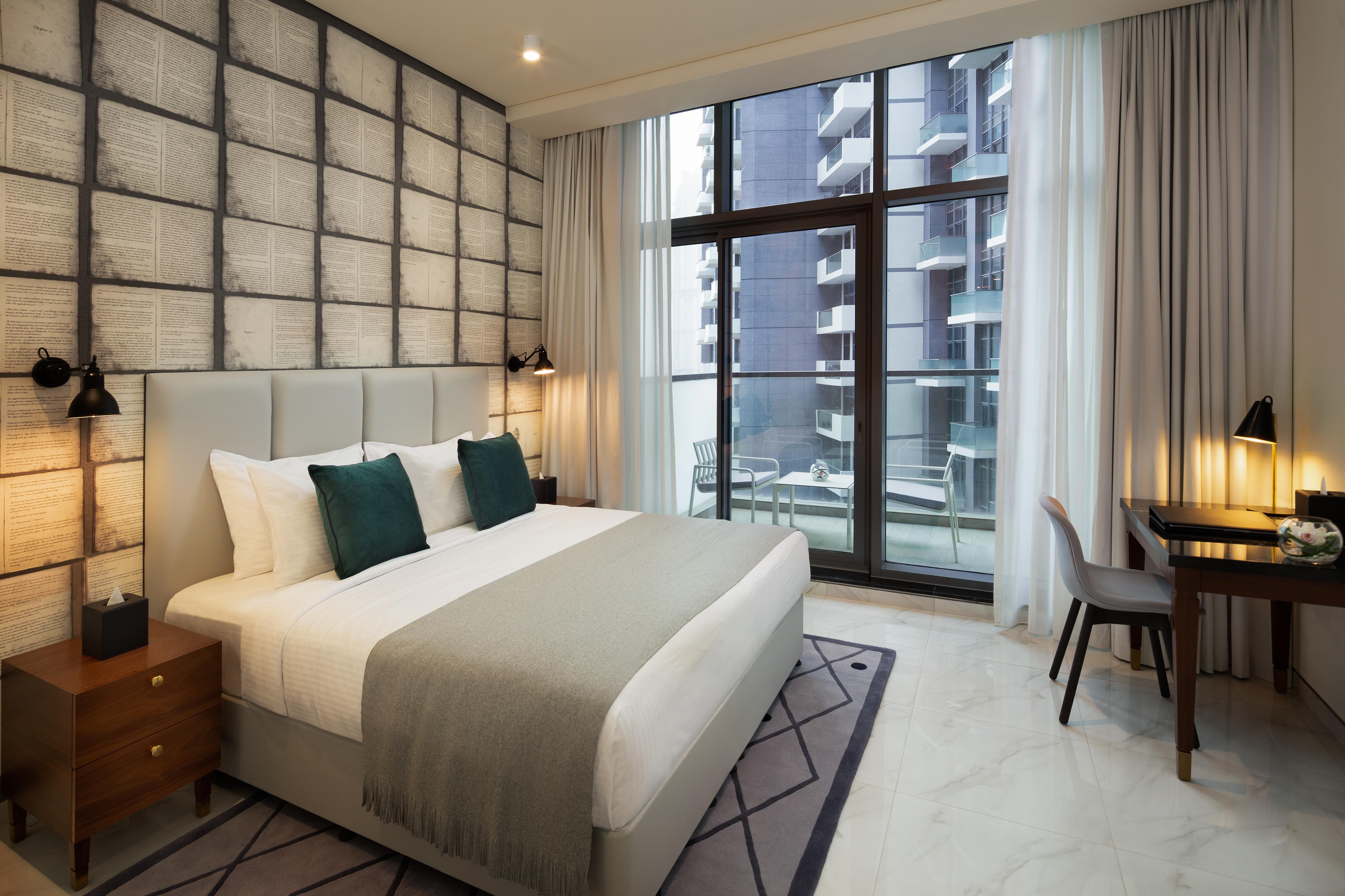 Aparthotel Millennium Atria Business Bay Dubái Exterior foto A bedroom at the hotel