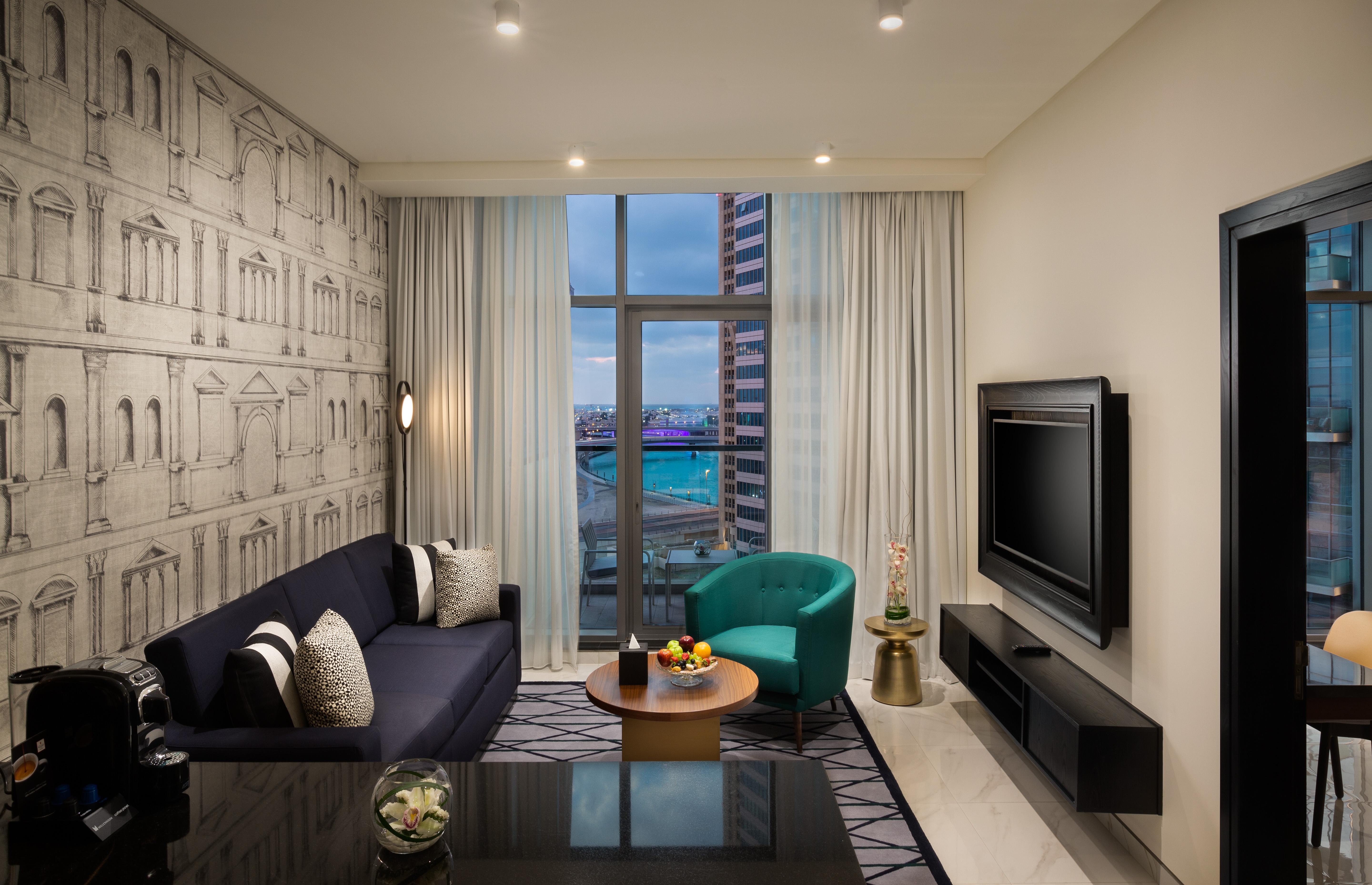 Aparthotel Millennium Atria Business Bay Dubái Exterior foto Living room