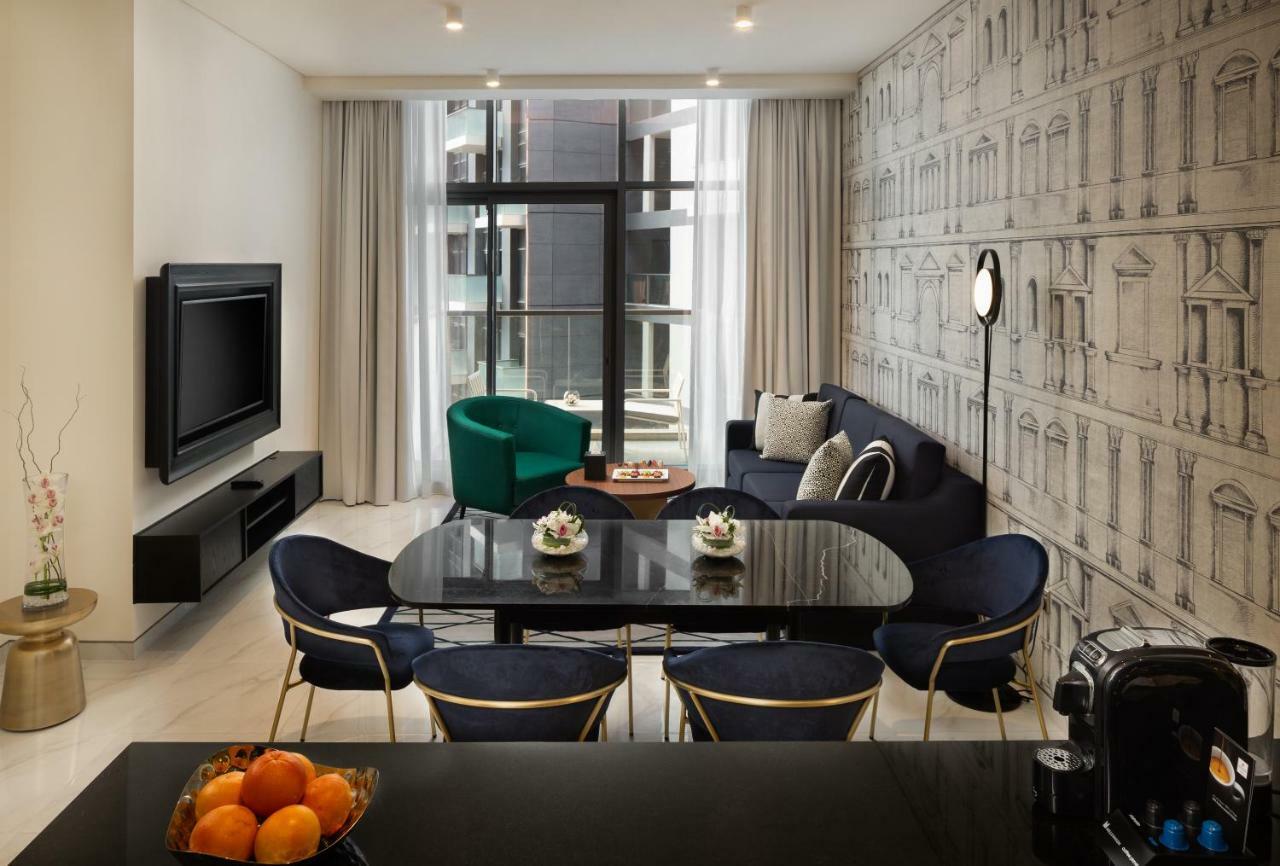 Aparthotel Millennium Atria Business Bay Dubái Exterior foto A living room in a serviced apartment in Hong Kong